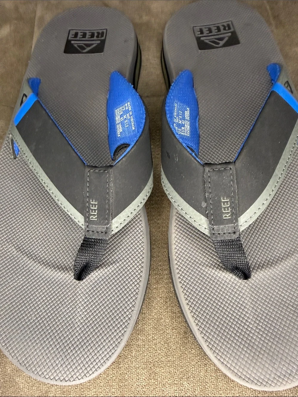 Reef Fanning Men's Gray and Blue Flip-Flop Sandals with bottle opener on sole